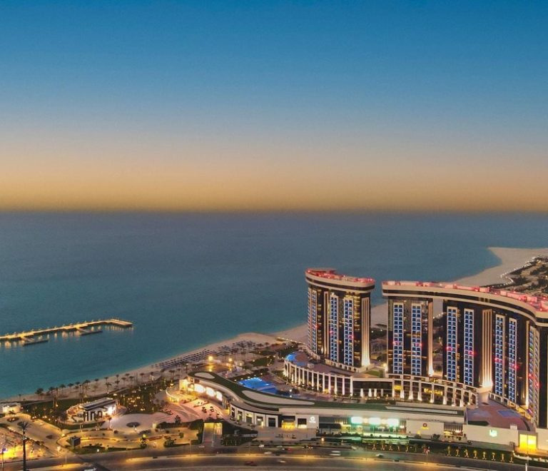 A luxury hotel on Egypt's North Coast, overlooking the ocean at sunset