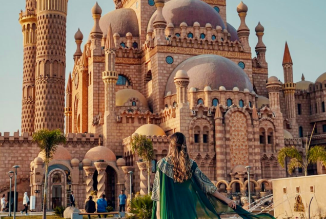 Tourist admiring the architecture of the Al Sahaba Mosque in Sharm El-Sheikh, Egypt