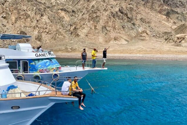 Panoramic view of Taba’s coastline with luxury resorts, sandy beaches, and the Red Sea